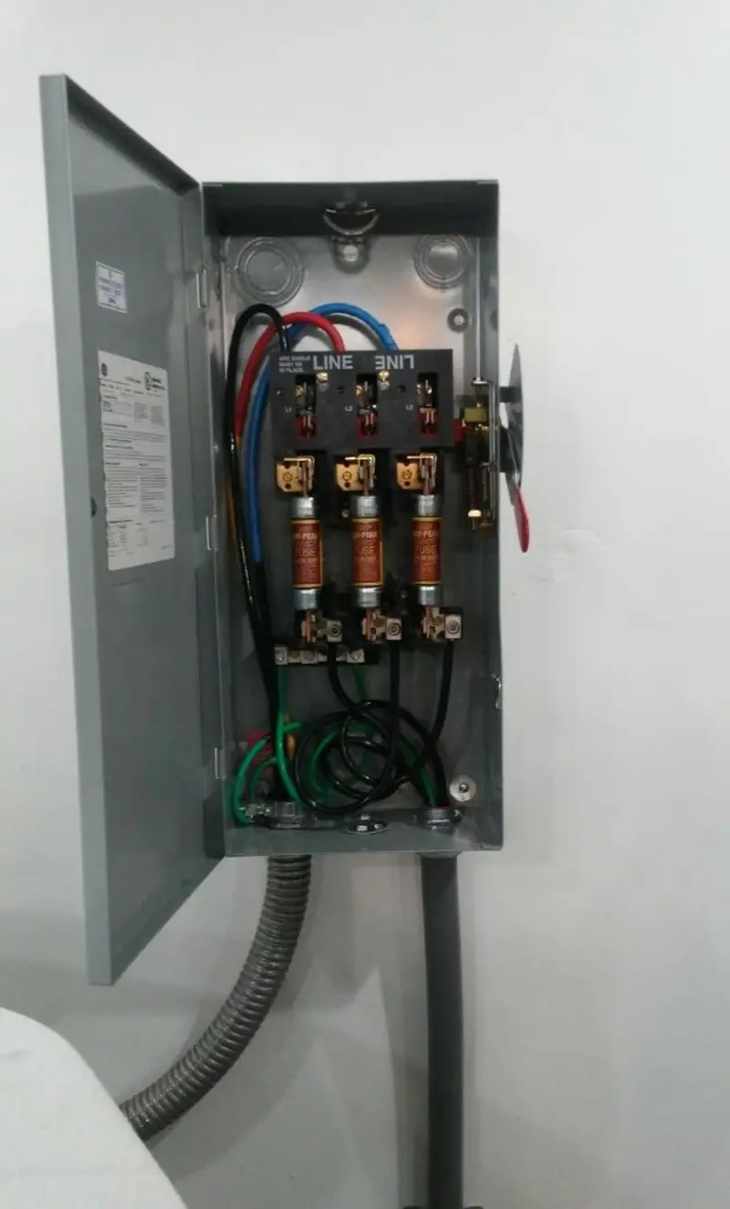 Three-phase disconnect switch installed for Smoke Detector Installation in Sanibel